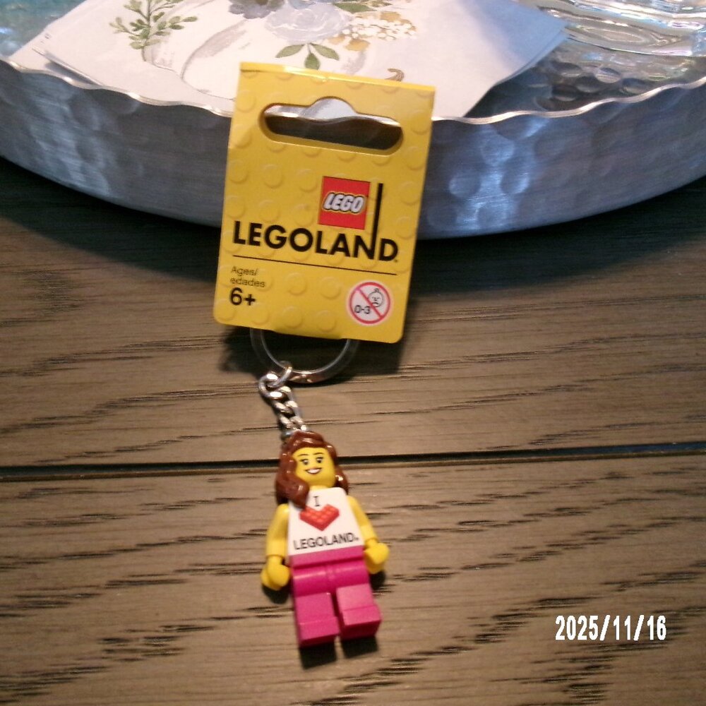 NEW LEGO I love Legoland keychain - RARE Lego Land Girl Minifigure Brown Hair
